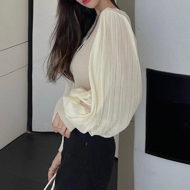 シースループリーツトップス