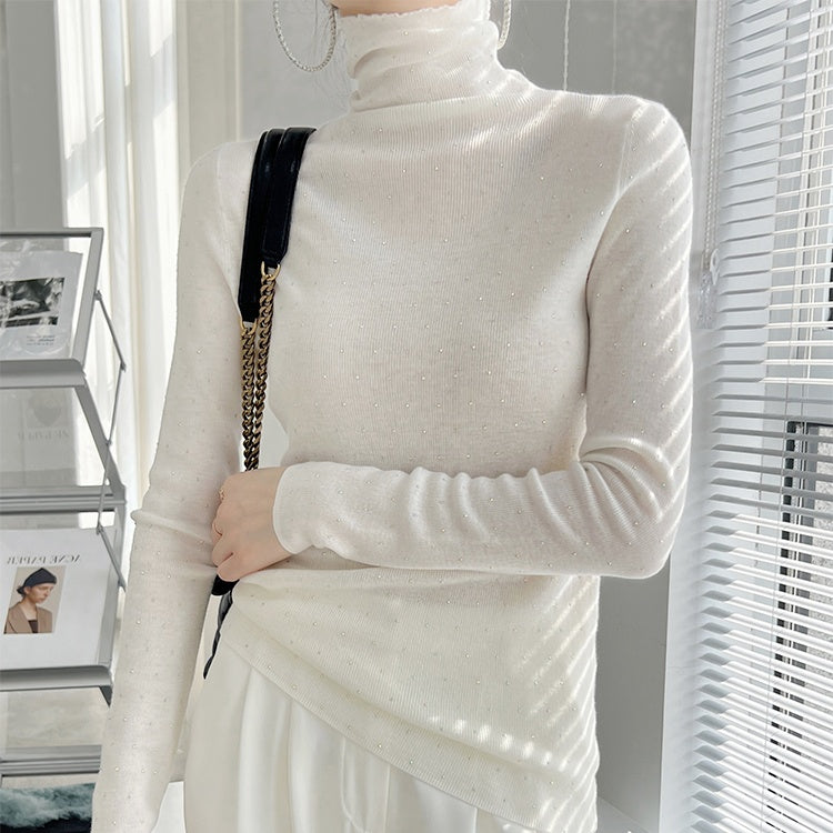 タートルネックストーンニット